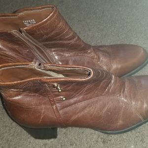 Brown leather booties with a 1 inch heel.